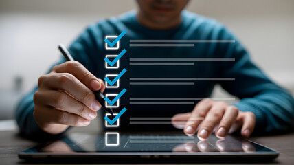 Person Filling Out Digital Survey Checklist on Tablet for Quality Assurance and Feedback