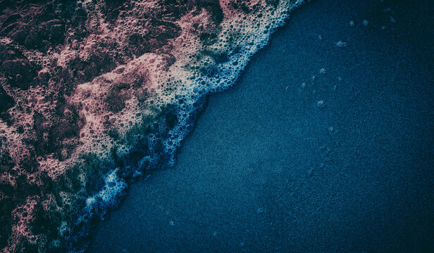 dark blue sand beach
