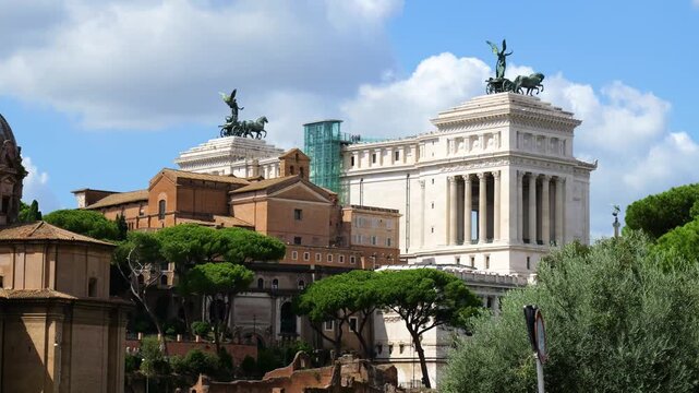 victor emmanuel ii national monument visible monumental scale rome cityscape from afar historic landmark cultural heritage urban architectural grandeur public space 