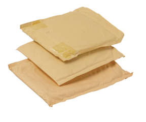 Stack of old padded bubble mailers ready for shipping