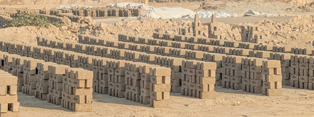 Red bricks Solid clay bricks used for construction, solid fireproof clay brick used for the construction of fireplaces and stoves, on an isolated white background