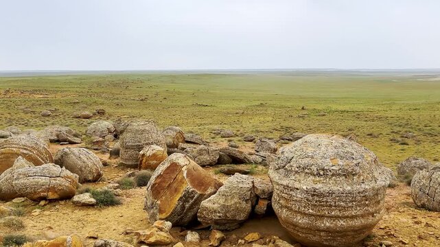 View of the valley of stone balls. Mangystau region.Unique natural places of Kazakhstan. Valley of the Balls. Spherical formations in the Torysh tract were formed about 120-180 million years ago. 4К
