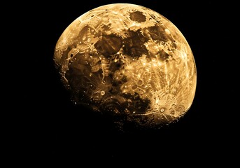 Full Moon Illuminated in Night Sky