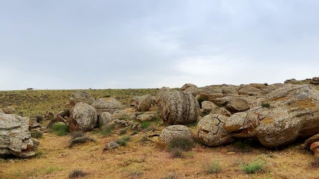 View of the valley of stone balls. Mangystau region.Unique natural places of Kazakhstan. Valley of the Balls. Spherical formations in the Torysh tract were formed about 120-180 million years ago. 4К