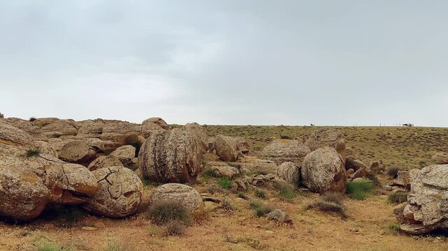 View of the valley of stone balls. Mangystau region.Unique natural places of Kazakhstan. Valley of the Balls. Spherical formations in the Torysh tract were formed about 120-180 million years ago. 4К