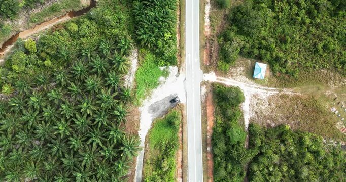 Aerial Drone Footage Of Pugu Fishing Village,Background Green Mount Gading Lundu And Open Sea With White Sandy Beach,That Connected To Sematan Town,Borneo,Malaysia