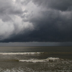 Dark rain clouds over a beach near Galle, Sri Lanka.