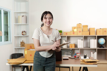 E-commerce Entrepreneur Managing Shipments in Home Office