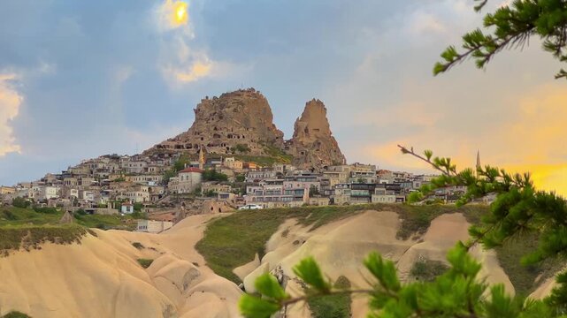 Goreme, Turkey, May 8, 2024: Uchhisar Fortress city. The famous Uchhisar Cave Castle in Cappadocia. The big stone town of Uchkhisar in hot summer weather. 4K