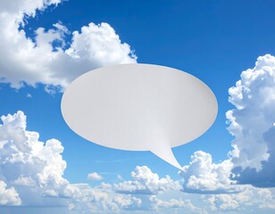 White speech bubble floating in vibrant blue sky with fluffy white clouds