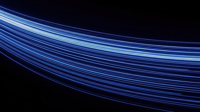 Abstract blue light trails on black background