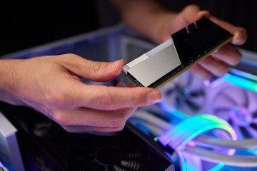 Upgrading computer with RGB lighting, Close up of hardware components during upgrade, Detailed view...