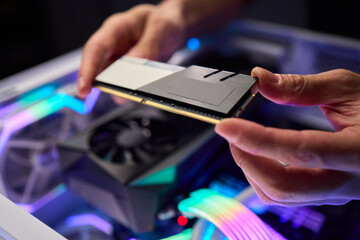 Upgrading computer with RGB lighting, Close up of hardware components during upgrade, Detailed view...