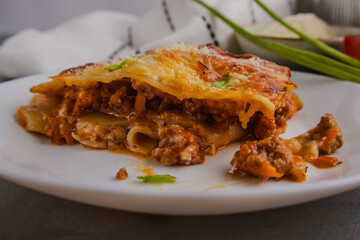 Delicious Homemade Lasagna Served on a White Plate
