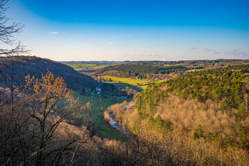 Obraz premium View over UNESCO Global Geopark Famenne Ardenne and river Lesse from viewpoint Rocher a Pic located between Tellin and Resteigne
