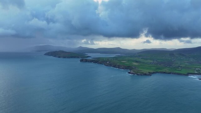 Wild Ireland entrance to Dingle fishing harbour and tourist town from Kenmare Bay with showers Epic Kerry Locations