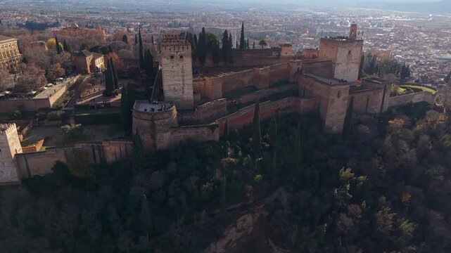 Scenic aerial footage showing the historic Alhambra palace and fortress complex in Granada, Andalucia. Spain