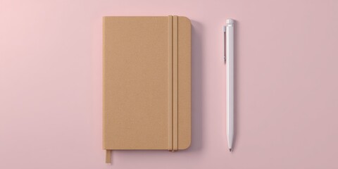 Minimalist flat lay of a brown notebook with white pen on pastel pink background for elegant design