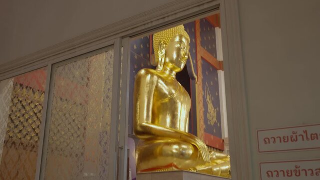 Golden Buddha Statue in the ubosot at Wat Phanan Choeng temple,Phra Nakhon Si Ayutthaya, Thailand, World Heritage Site , Public place