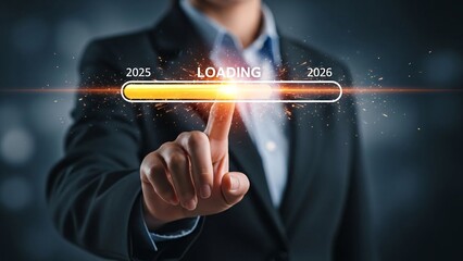 Businessman in a dark suit interacts with a futuristic digital loading bar representing progress from 2025 to 2026 with glowing effects and technological theme for innovation and growth