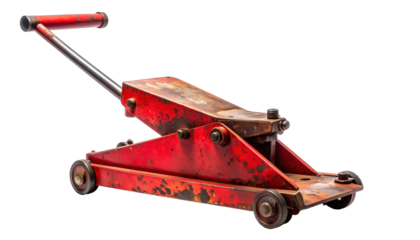 Old, rusty red hydraulic jack with handle on wheels, ready for vehicle lift