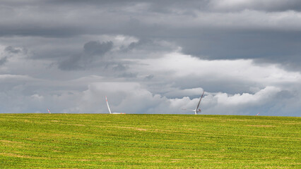 the hill, the meadows and the wind turbines