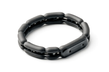 Stretchy silicone cable organizer ring with elongated oval shape and matte soft texture for desk use