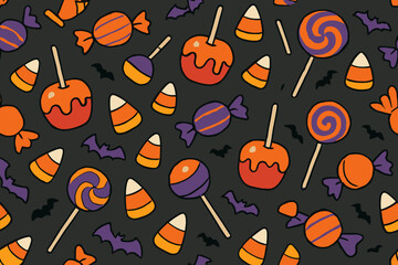 Halloween sweet patterns with candies and bats in various colors on dark background