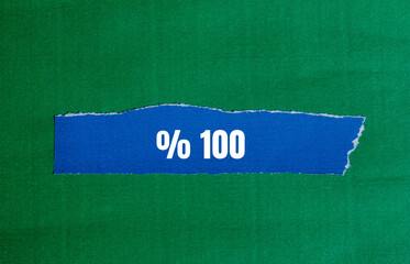 One hundred percent message written on ripped torn paper background. Conceptual One hundred percent symbol. Copy space.