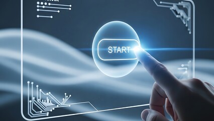 A finger pressing a glowing start button on a futuristic interface