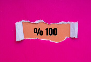 One hundred percent message written on ripped torn paper background. Conceptual One hundred percent symbol. Copy space.