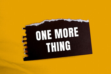 One More Thing message written on ripped torn paper background. Conceptual One More Thing symbol. Copy space.