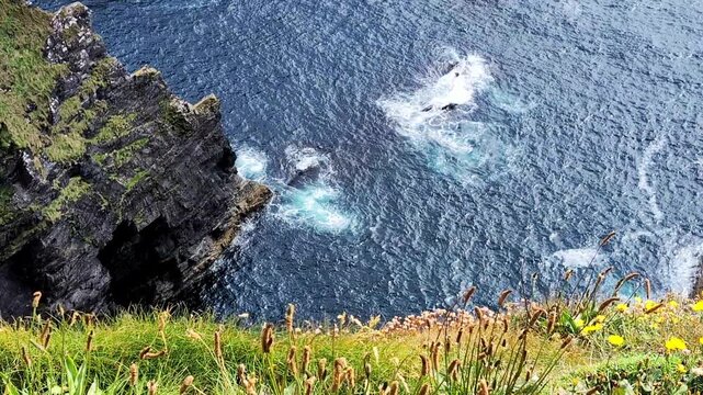 Scenic view on rocks and Atlantic ocean from Kerry Cliffs, Portmagee, Ring of Kerry, Ireland.	