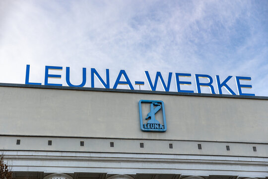 Roof view of the administration building at Leuna chemical factory main gate, featuring facade emblem and rooftop lettering. Symbol of Eastern Germany&rsquo;s chemical industry crisis and industrial decline