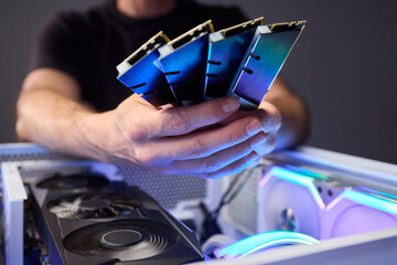 Computer hardware setup highlighting RAM sticks and graphics card details, Credentials for professional technical environment featuring RAM modules and GPU display