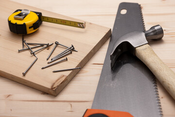 Construction Tools and Thick Wood Planks for Building Industry Work