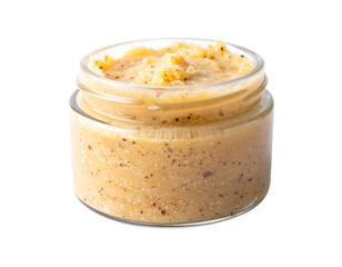 Jar of homemade organic body scrub with natural ingredients.