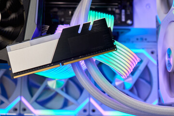 Elegant gaming hardware, High-performance RAM with cooling system, Premium illuminated memory...