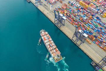Aerial view of Manufacturing logistics cargo container ship at ship port.export import business logistic international.