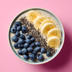 Nutritious Breakfast Yogurt Bowl Topped with Fresh Sliced Bananas and Organic Blueberries