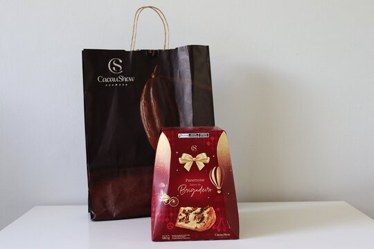 Salvador, Brazil - December 26, 2025: A Brigadeiro flavored Panettone produced by Cacau Show. Christmas, gift concept. Cacau Show is a Brazilian chocolate company. 