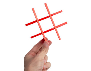 Hand holding Hashtag Symbol isolated on a white background