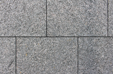 Obraz premium Close up of gray square tile wall texture background. 