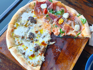 Top view of two side pizza Truffle and mushroom, Sliced ​​pork. Italian food on the table