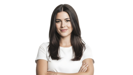 A young woman with long dark hair smiling confidently with her arms crossed against a plain white background