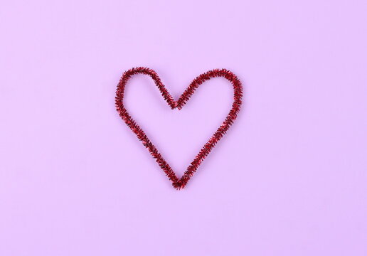 Minimal red glitter heart shape on soft pastel pink background. Romantic love concept for Valentine's day, wedding, anniversary, social media post, greeting cards and branding white copy space - Powered by Adobe