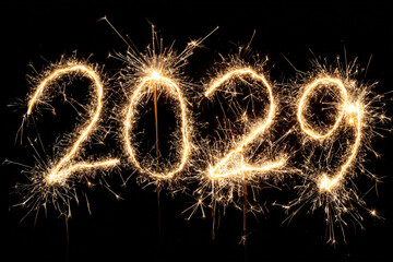 The numbers 2029 illuminated by bright sparklers against a dark background creating a festive and celebratory mood