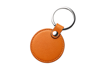 Orange leather circular keychain with metal ring and snap button, isolated on a transparent background