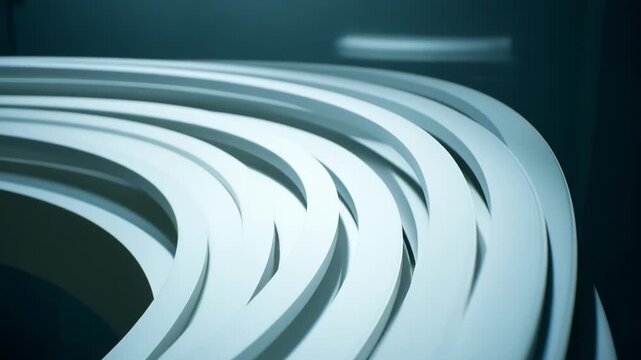 Medium shot of flexible extruded architectural profiles bending smoothly around curved surfaces highlighting innovative design adaptability in modern construction.