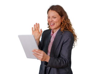 Businesswoman having happy video call using tablet, waving hand and laughing, remote communication and online meeting